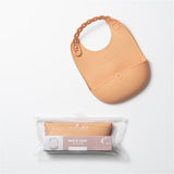 Roll & Lock silicone bib